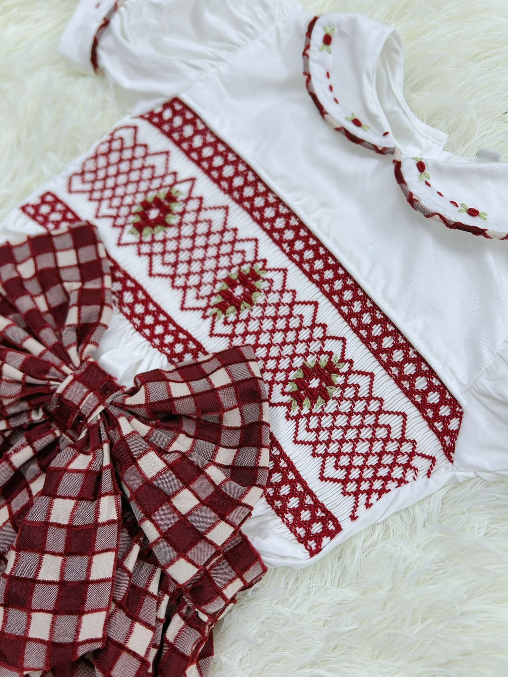 Burgandy “Aubrey” Handsmocked Romper.