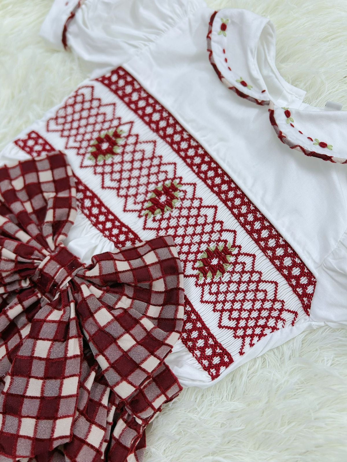 Burgandy “Aubrey” Handsmocked Romper.