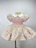 Cream “Florence” Floral Handsmocked Frock.