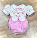 Pink and White “Minnie” Polka Dot Smocked Romper Suit.