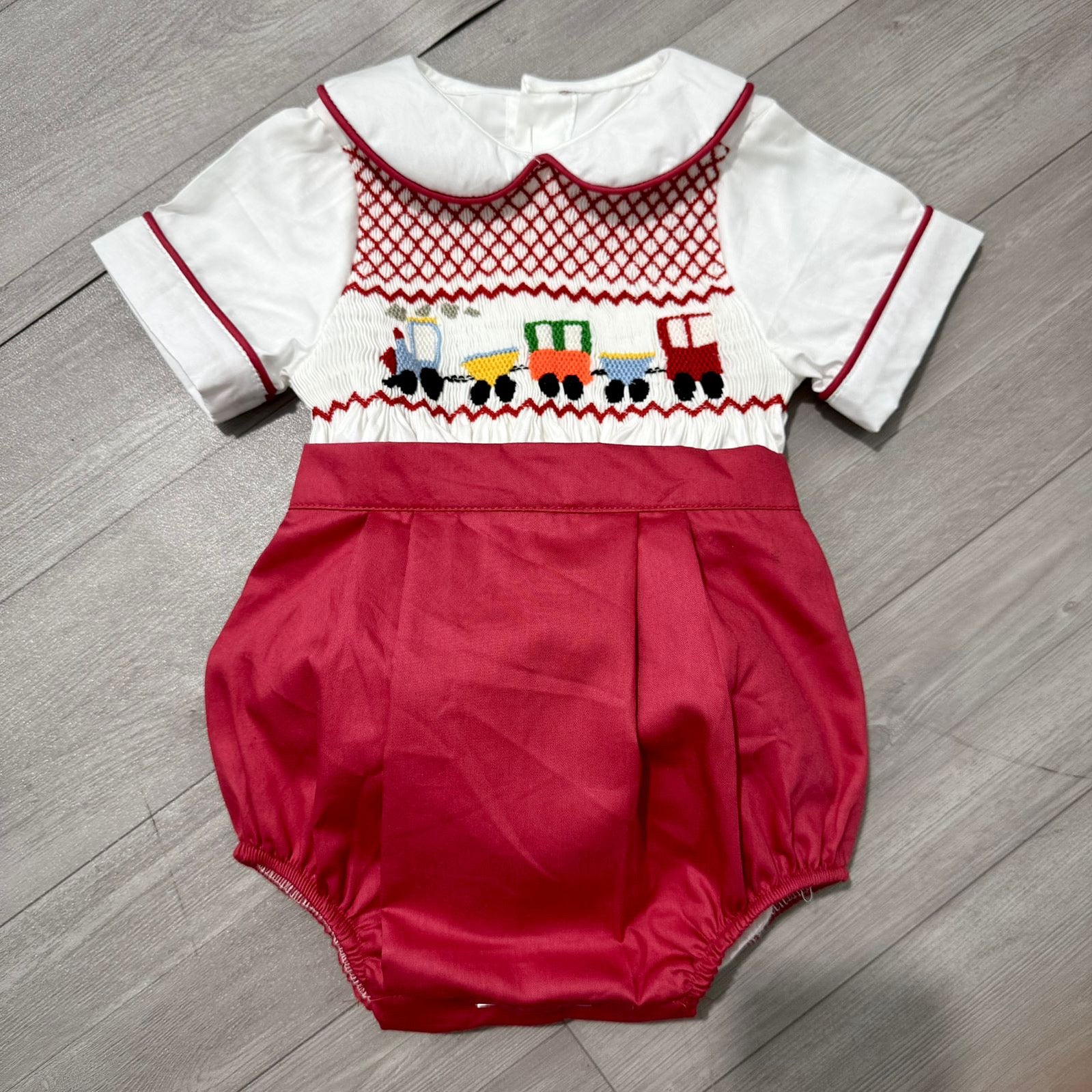 Red “George” Handsmocked Train Suit.