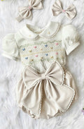 Cream “Vanilla” handsmocked romper. 🍨 (Two week pre order)