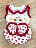 Red “Berry Sweet” Sleeveless smocked romper.