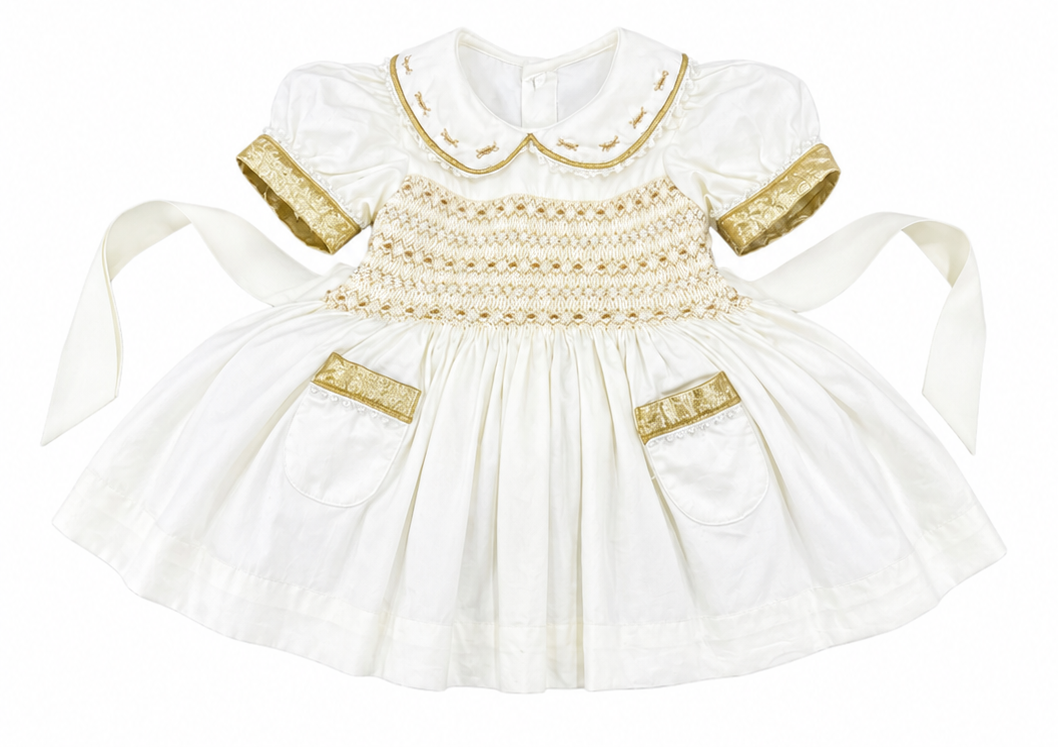 Cream and Gold “Angel” handsmocked frock. Bows and Bloomers to match.