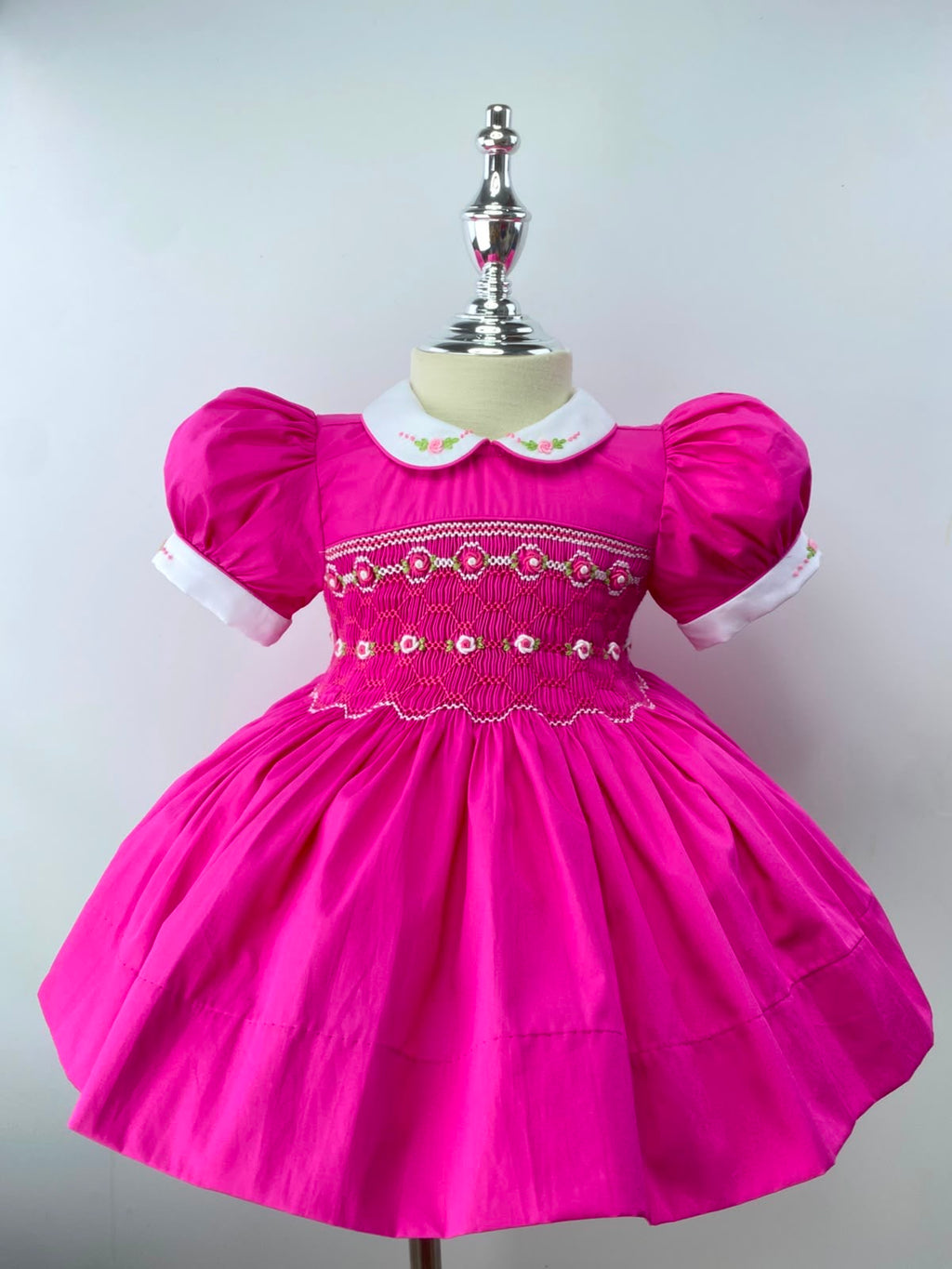 Hot Pink Handsmocked  “Barbie” frock. (Bows and Bloomers to match) 10 day dispatch.