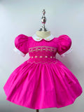 Hot Pink Handsmocked  “Barbie” frock. (Bows and Bloomers to match) 10 day dispatch.