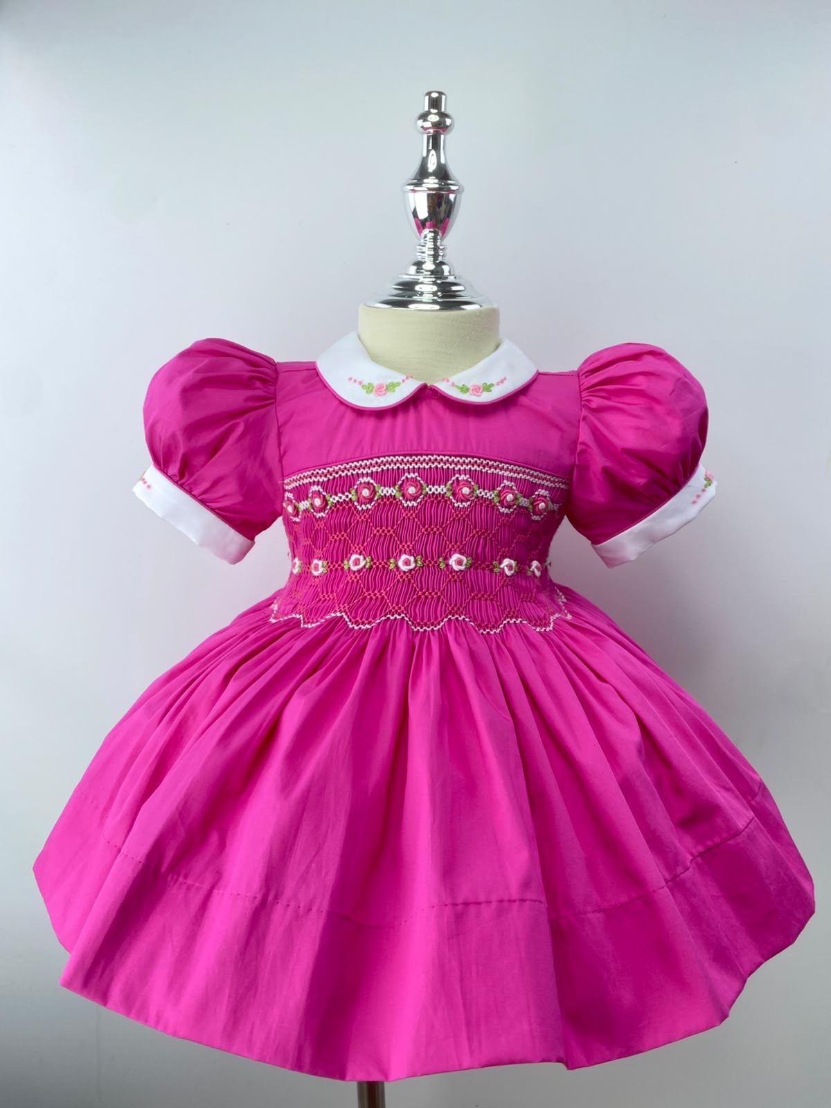 Hot Pink Handsmocked  “Barbie” frock. (Bows and Bloomers to match) 10 day dispatch.