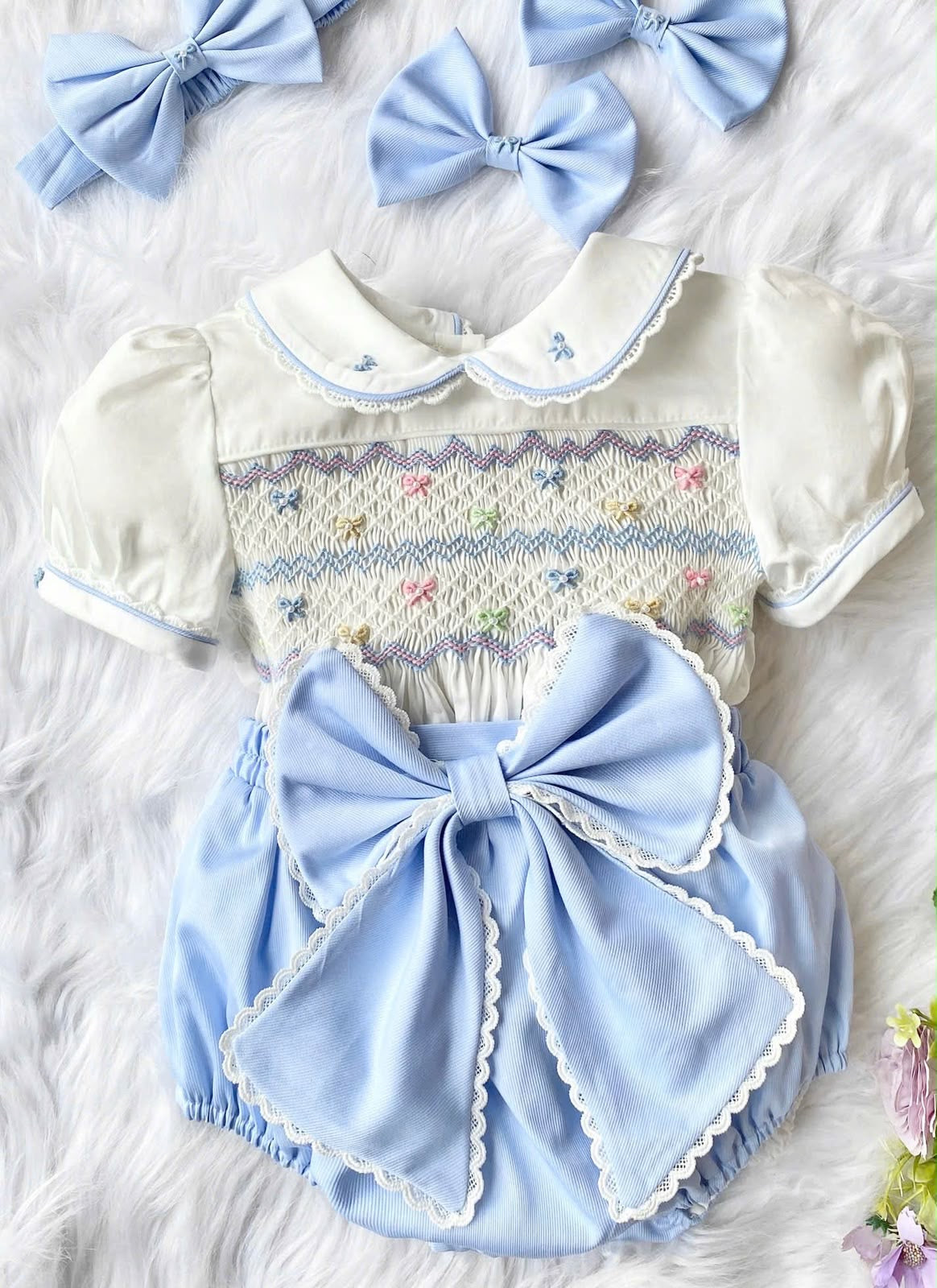 Blue “Bonnie” handsmocked romper (two week pre order)