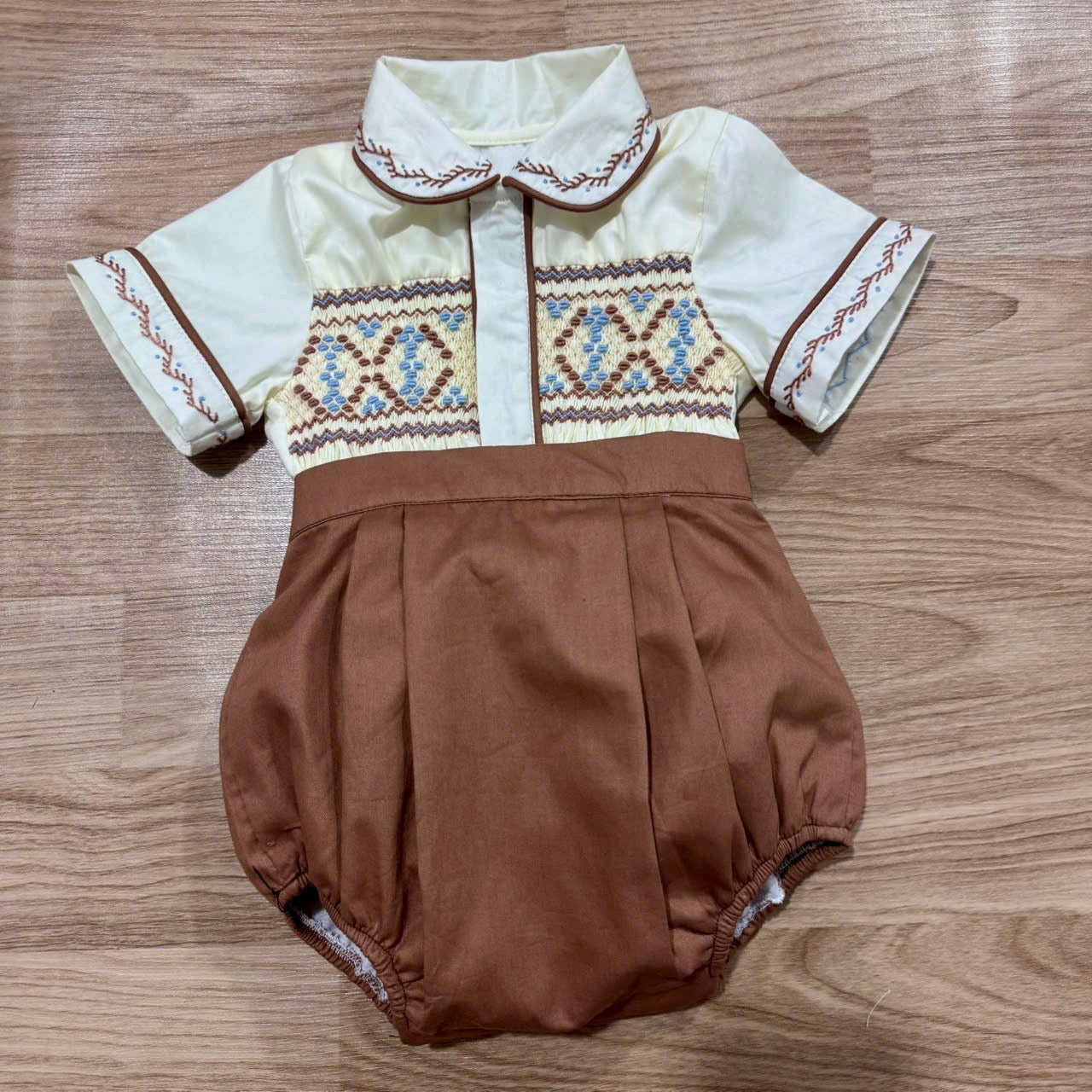 Cream “Wyatt” Western inspired handsmocked suit.