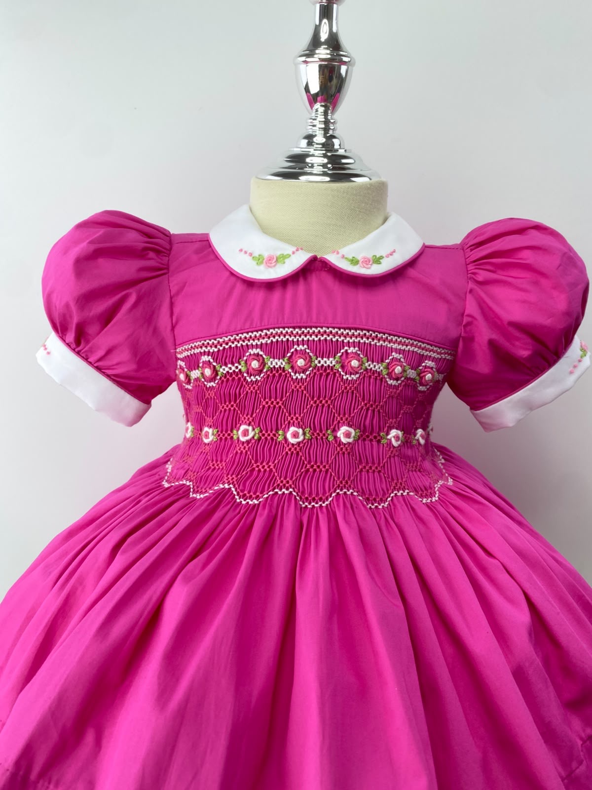 Hot Pink Handsmocked  “Barbie” frock. (Bows and Bloomers to match) 10 day dispatch.