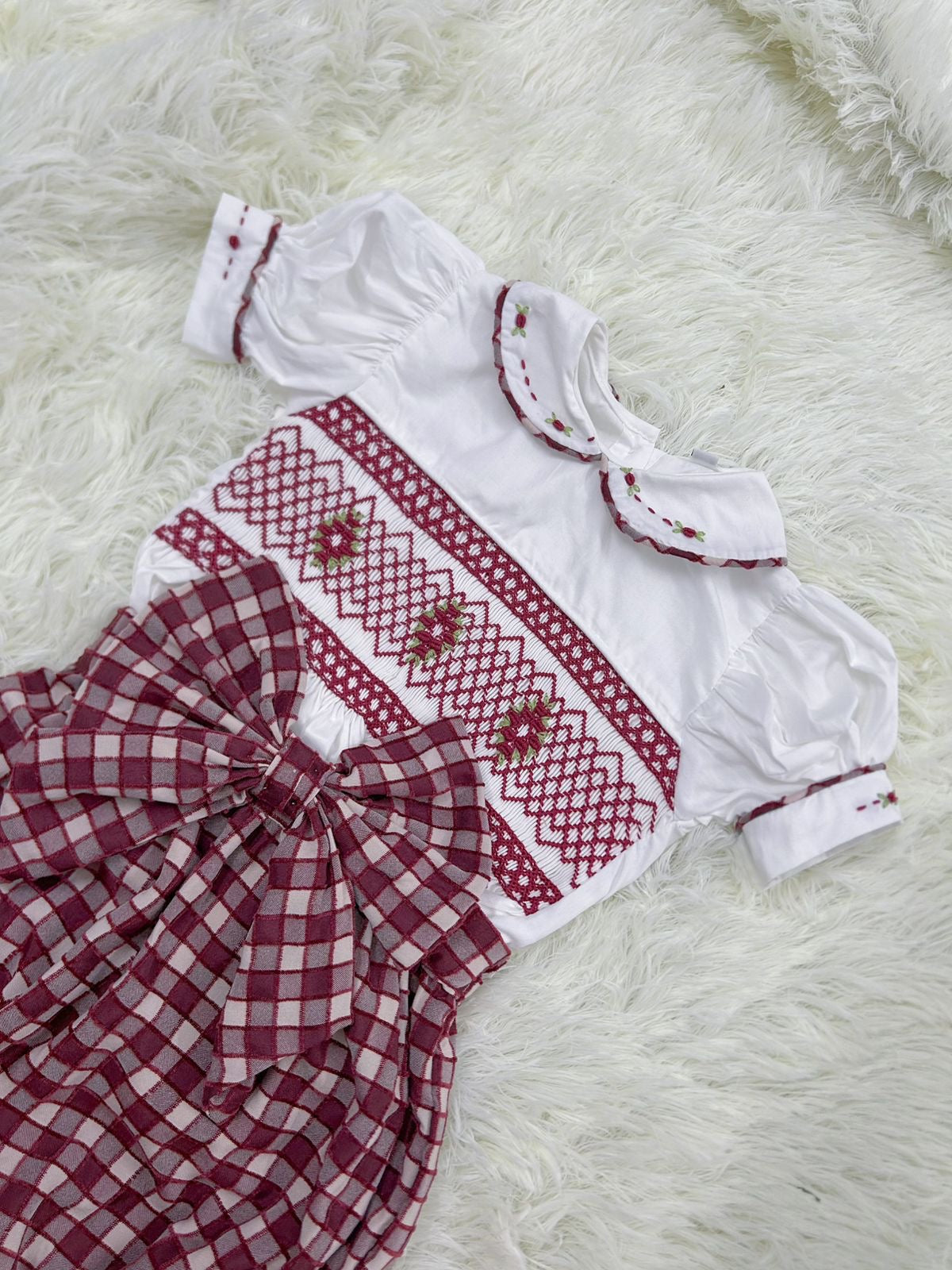 Burgandy “Aubrey” Handsmocked Romper.
