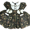 Green “Harrods” inspired classic frock. Comes with bows and bloomers. (End of September beginning of October delivery)