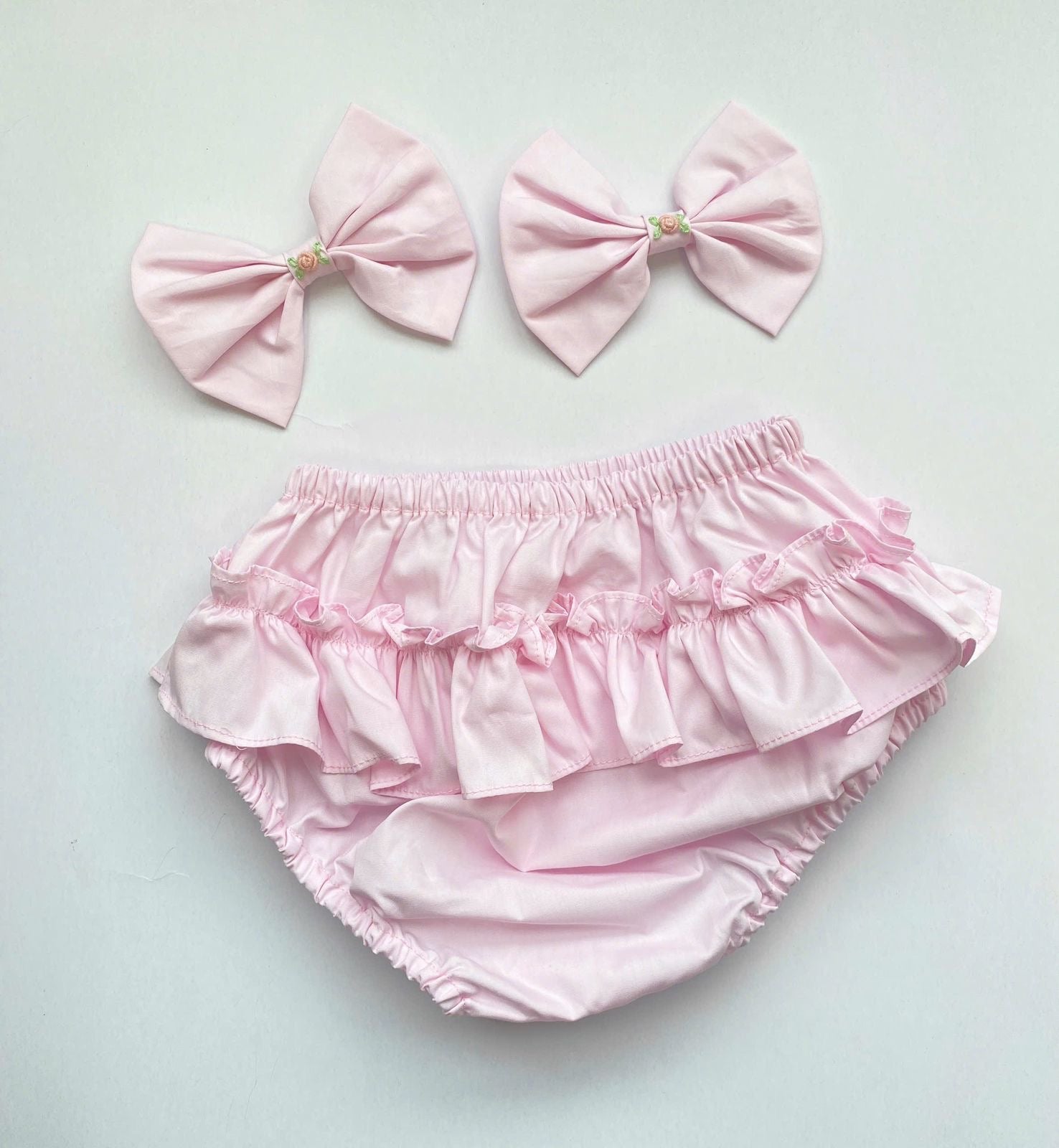 Baby Pink Handsmocked Frock “Poetta” Bows and Bloomers to match.