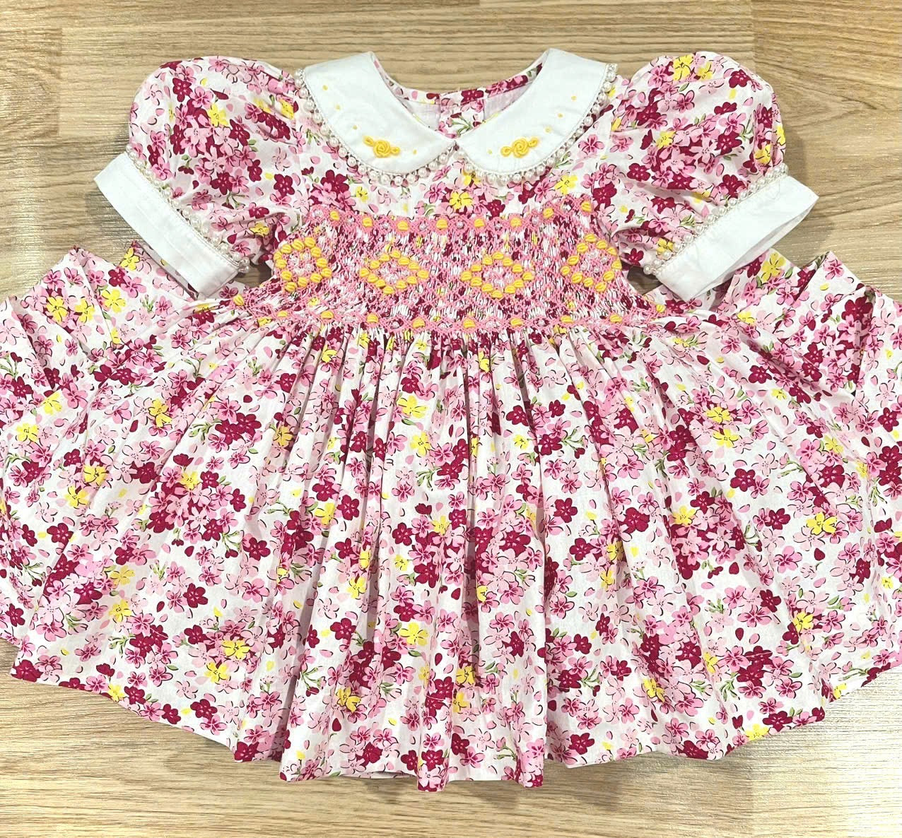 Pink Floral “Luella” Smock. Bows and Bloomers included.