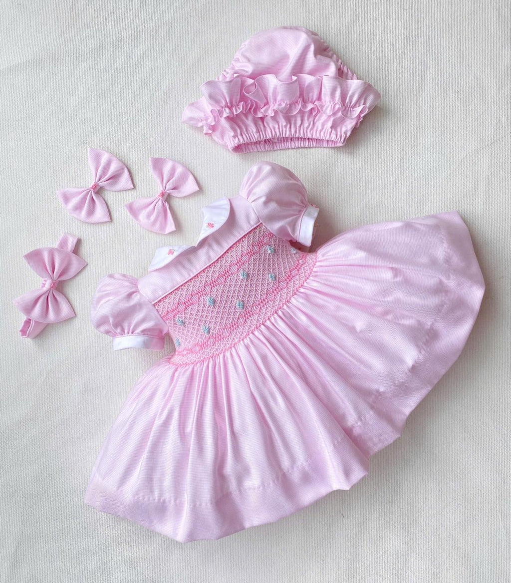 Baby Pink “TALLULAH” handsmocked frock. (Bows and Bloomers to match) 10 day dispatch.