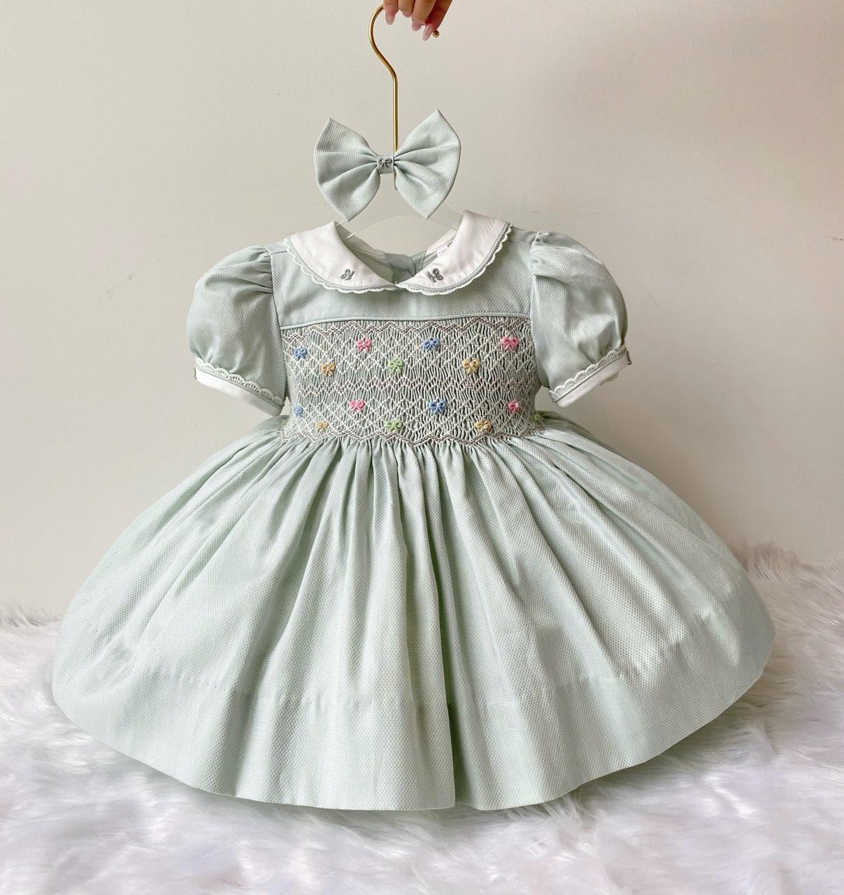 Sage/Grey “Blondie” handsmocked frock. (Bows and Bloomers to match) 10 day dispatch)