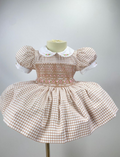 Beige “Niamh” Handsmocked Frock.