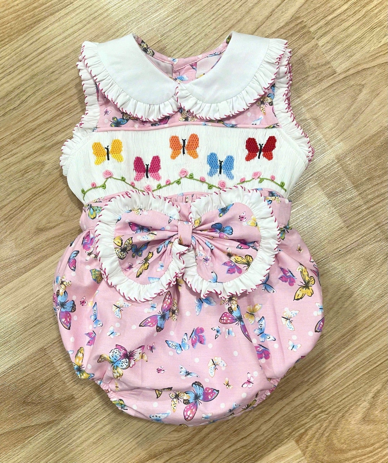 Pink Handsmocked “Butterfly Dreams” Romper 4-6years comes with skirt and blouse. Bows/Headband to match ✨