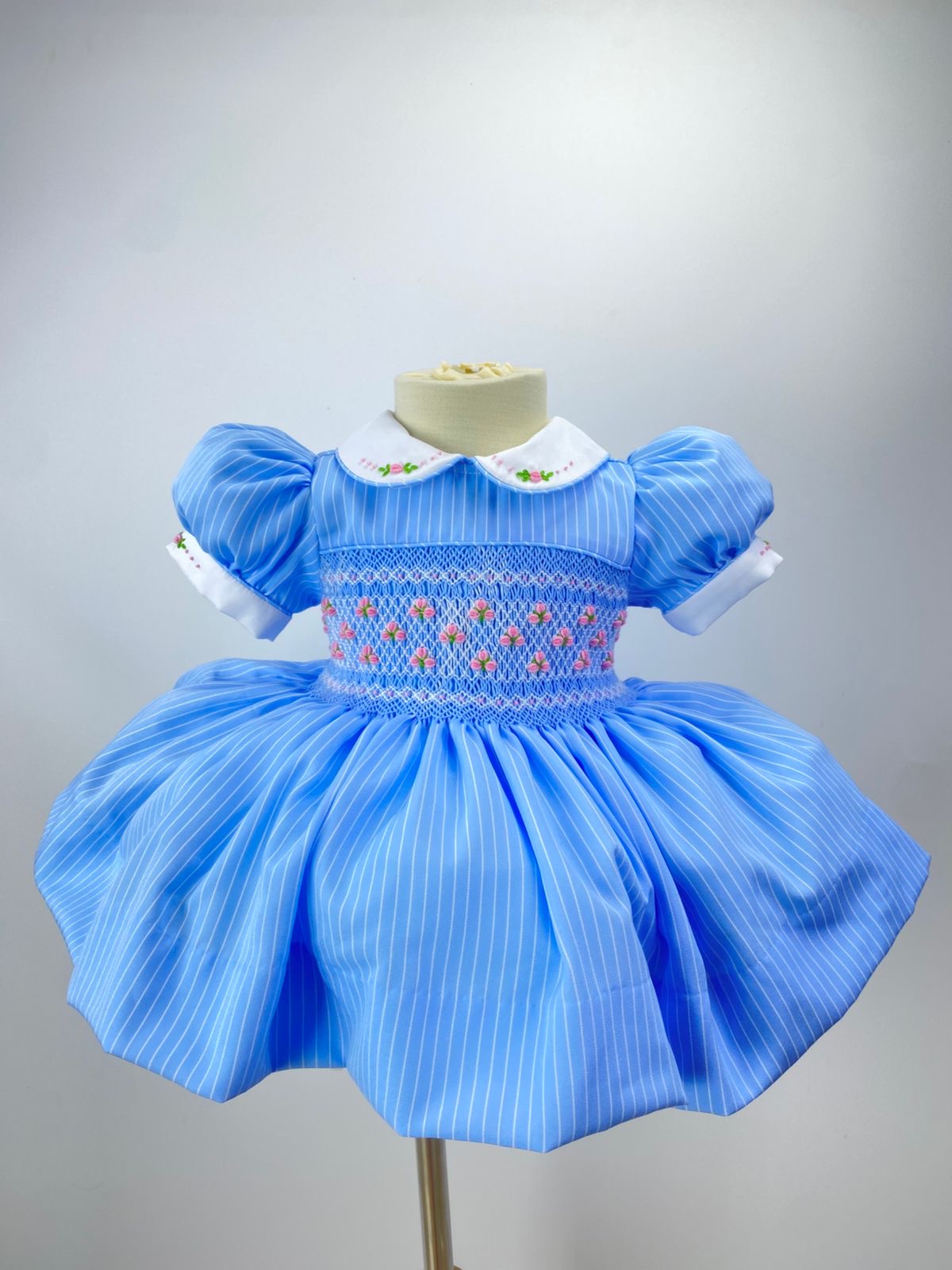 Blue “Elsie” Handsmocked Frock.